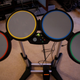 Illustration for article titled Rock Band Instruments Review (Verdict: Quality, but Can Your Livingroom Take the Mess?)